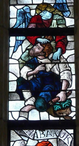 Habakuk wordt met een mandje voedsel dooreen engel aan zijn haren gesleept naar Daniël in de leeuwenkuil (Daniël 14).
