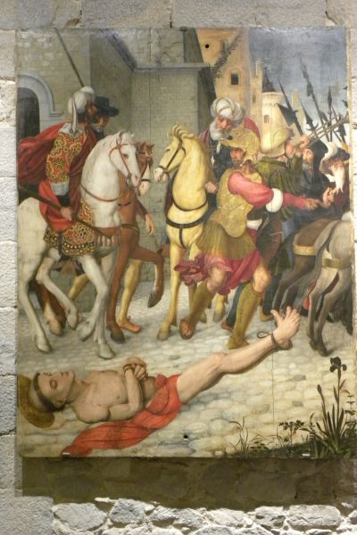 Felix - net als Jezus tijdens diens lijden ontkleed! - achter paarden over de grond gesleept.
